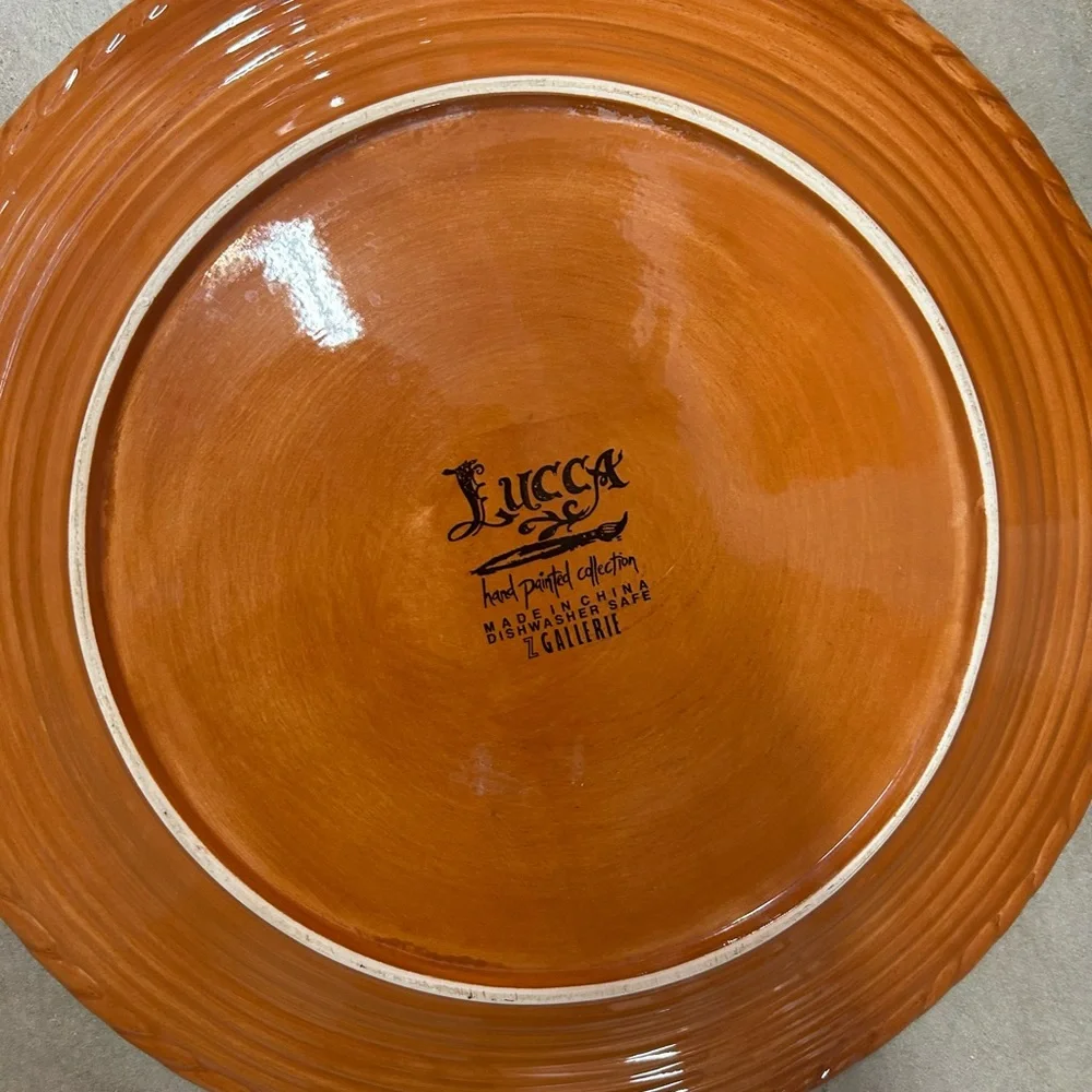 LUCCA handpainted ceramic terracotta bowls and charger plates from Z Gallerie